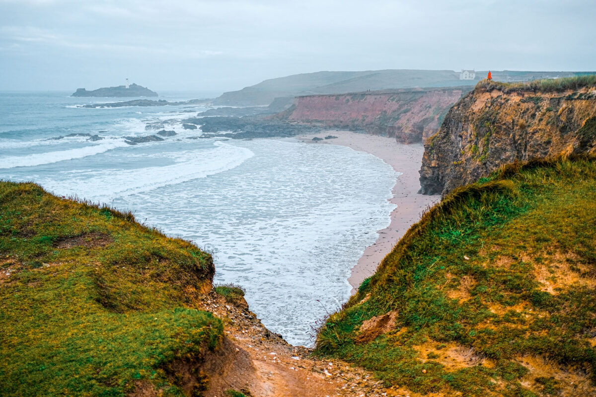The amazing Godrevy coastline with Godrevy Lighthouse in the background.