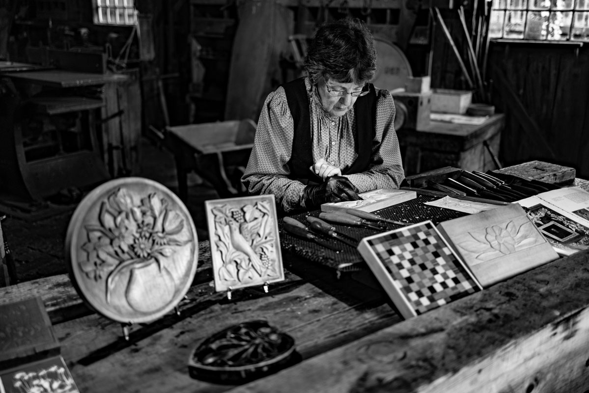 A worker creating something out of wood int he carpentry shop at Blists Hill.

Things to Do in Ironbridge Gorge