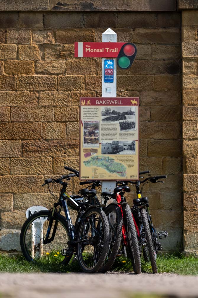 Bikes under a sign that says Bakewell on the Monsal Trail.