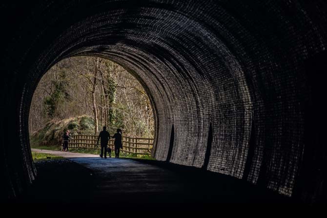 Silhouettes in one of the shorter tunnels that doesn't have lighting.