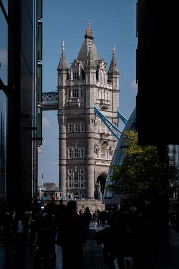 Tower Bridge, viewed between two other buildings
