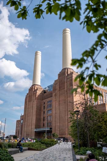 Battersea Power Station with trees framing the picture.